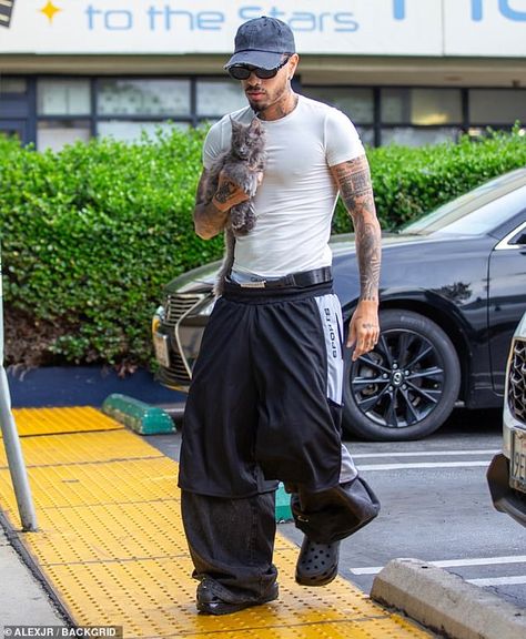 Outing: The Puerto Rican singer, 30, carried his feline friend as he grabbed a smoothie from the Earthbar amid his split Latino Outfit, Raw Alejandro, Outfits Layout, Street Style Outfits Casual, Fashion Outfits Men, White Shirt Outfits, Shirt Outfit Men, Black Men Street Fashion, Outfit Layout