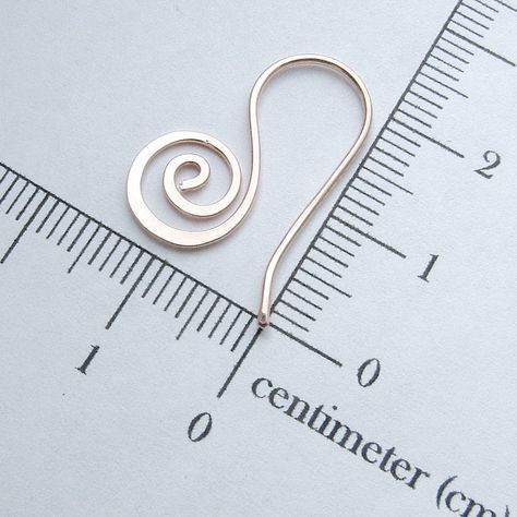 Small sterling silver unfurling earrings. A petite solid sterling silver version of the coiled open hoop unfurled earrings.  These little 10mm silver coils were made from 20 gauge eco friendly recycled sterling silver wire and hand formed and cold forged into these delicate earrings. The coiled silver hoop earrings are about 3/4 inch long (20 - 22mm); the coil by itself is only about 10mm wide.  Please see measurement photo. Click here to go to my shop's main page. http://www.etsy.com/shop/Artis Small Silver Earrings, Small Silver Hoop Earrings, Bijoux Fil Aluminium, Womens Jewelry, Wire Work Jewelry, Acrylic Jewellery, Handmade Wire Jewelry, Earrings Small, Wire Earrings