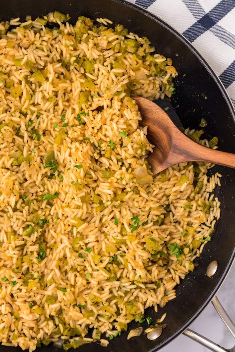 Classic, bold flavors marry together in this cajun rice recipe with tender bell pepper, onion, and celery. Toss it with fragrant basmati rice for a mouthwatering Southern side to bring the spice to any main dish. Cajun Style Rice, Easy Cajun Rice, Southern Rice Recipes, Cajun Rice Recipes, New Orleans Rice, Bell Pepper Rice Recipe, Southern Rice, Louisiana Rice, Cajun Rice Recipe