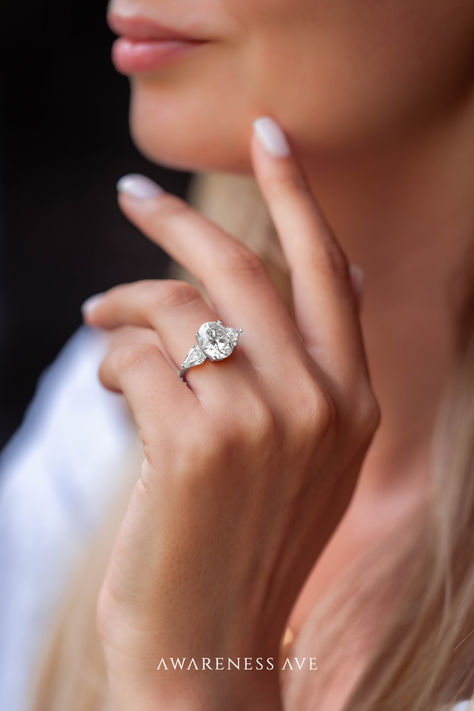 Oval-cut diamonds are the hottest engagement ring trend of 2024 - find yours at Awareness Avenue Engagement Rings 2024 Trends, Silver Rings Aesthetic, Big Engagement Ring, Rose Gold Moissanite Ring, Big Engagement Rings, Ethical Engagement Ring, Rings Aesthetic, Moissanite Ring Set, Trending Engagement Rings