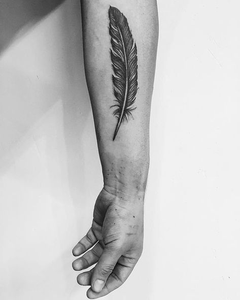 Feather Tattoo Ideas | POPSUGAR Beauty Feather Pen Tattoo, A Feather Tattoo, Tattoo Plume, Feather Tattoo For Men, Owl Feather Tattoos, Feather Tattoo Black, Phoenix Feather Tattoos, Eagle Feather Tattoos, Feather Tattoo Arm