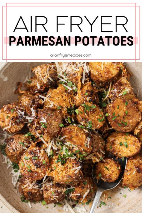 air fryer parmesan potatoes in a bowl with a spoon Air Fryer Baked Potatoes Time, Cheesy Air Fryer Potatoes, Air Fryer Small Potatoes, Air Fryer Parmesan Potatoes, Parmesan Crusted Potatoes Air Fryer, Baby Potato Recipes Air Fryer, Parmesan Potatoes Air Fryer, Parmesean Potatoes, Potatoes In Air Fryer