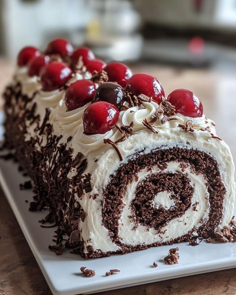 Elegant Black Forest Roll Cake 🍰🍒 Ingredients: - 4 large eggs - 1 cup granulated sugar - 1/3 cup water - 1 teaspoon vanilla extract - 1 cup all-purpose flour - 1/3 cup unsweetened cocoa powder - 1 teaspoon baking powder - 1/4 teaspoon salt - 1 cup heavy cream - 1 tablespoon powdered sugar - 1 teaspoon vanilla extract (for cream) - 1 jar (about 24 oz) cherry pie filling - Chocolate shavings for garnish Instructions: 1. Preheat the oven to 350°F (175°C). Line a 15x10-inch jelly roll pan with... Black Forest Roll Cake, Oreo Swiss Roll, Black Forest Swiss Roll, Chocolate Raspberry Swiss Roll, Chocolate Swiss Cake Roll, Jelly Roll Cake, Fun Holiday Food, Japanese Drinks, Roll Cakes