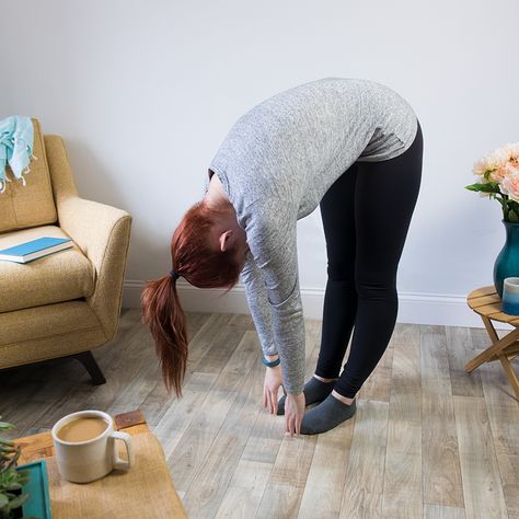 LittleThings.com : 5. Standing Toe Touch : Trapped Gas: 10 Stretches That Can Help You Pass Wind Quickly -- Stand with your feet placed firmly on the floor. Bending at the hips, reach your hands toward your toes. If you can't reach the floor, lean forward as far as you can, and balance your hands on a piece of furniture if you need to. Health explains that this pose can strengthen your spine and back muscles, which will relieve tension in your back and neck. If your gas pain is affecting your... Stretches To Relieve Gas, Trapped Wind Relief, How To Relieve Gas, Gas Relief Remedies, Painful Gas, Sickness Remedies, Gas Remedies, Getting Rid Of Gas, Stomach Gas