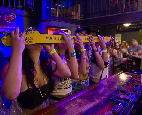 Tour guests taking “guitar shots” at The Whiskey Shot bar in Nashville Pub Aesthetic, Devney Perry, Halloween Bar, Bar Crawl, Spring Semester, Fall Semester, Escape Rooms, Birthday Party Planning, Pub Crawl