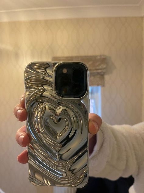 Aesthetic for men & woman heart chrome iphone case available in miltiple styles and sizes. Chrome Phone Case, Aesthetic For Men, Produk Apple, Girly Phone Cases, Diy Iphone Case, Iphone Obsession, Pretty Iphone Cases, Pretty Phone Cases, Apple Phone Case