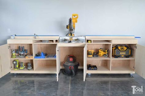 A miter saw station with all the bells and whistles. There is plenty of work space, stop blocks and loads of storage! Free building plans that can be adjusted to any miter saw. Miter Saw Station, Industrial Garage, Garage Workshop Layout, Table Saw Station, Saw Station, Mitre Saw Station, Miter Saw Table, Mitre Saw Stand, Garage Workshop Organization