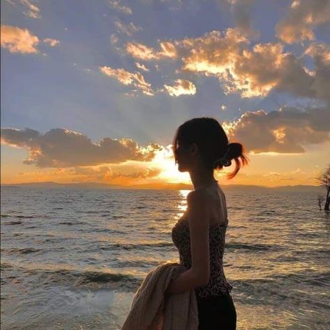 The Ocean, A Woman, Sun