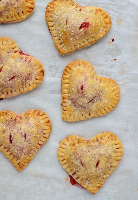 Strawberry Hand Pies {Heart Shaped!} – WellPlated.com Heart Shaped Strawberry, Strawberry Hand Pies, Cherry Hand Pies, Heart Shaped Food, Valentines Snacks, Hand Pie Recipes, Black Cherries, Bridal Shower Desserts, Hand Pie