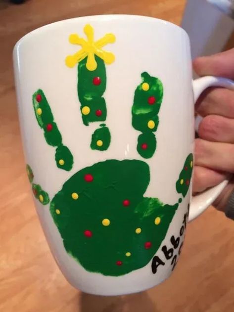 50+ Adorable DIY Christmas Gifts for Grandparents To Melt Their Hearts | HubPages Handprint Gifts For Grandparents Christmas, Christmas Crafts To Give Parents, Infant Holiday Gifts For Parents, Infant Keepsake Ideas, Christmas Mug Crafts For Kids, Handprint Christmas Gifts For Parents, Toddler Christmas Gifts To Make, Prek Christmas Crafts For Parents Gift Ideas, Diy Christmas Mugs Kids