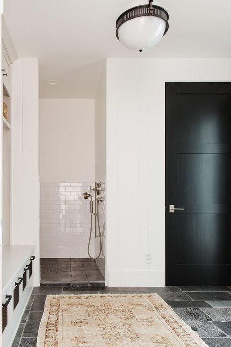 Take a Tour of this Stunning Modern Lakehouse | lark & linen Functional Mudroom, Modern Lake House, Mudroom Design, Dog Shower, Up House, Studio Mcgee, Black Doors, Mud Room, White Paneling