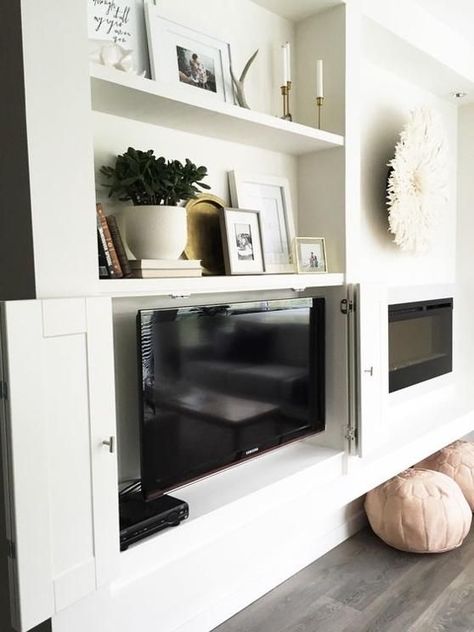 5 Ways to Make Your TV Less Conspicuos Tv Built Ins, Shelf For Tv, Built In Tv Cabinet, Hidden Tv Cabinet, Tv Built In, Living Room Built Ins, Hidden Tv, Fireplace Built Ins, Wall Bookshelves