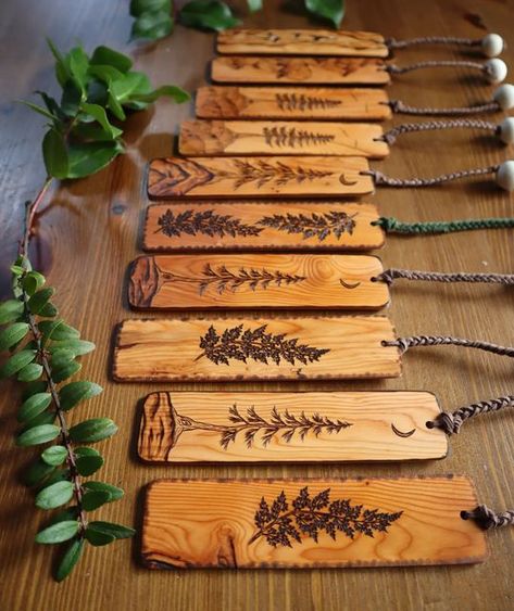 Silent Forest Designs on Instagram: "Our new Pacific yew bookmarks, and last order of the year recently landed at the beautiful @alcove_homegrown_living in Qualicum beach! 🌿 Our bookmarks are now completely handmade by my husband, and created with sustainability sourced wood from @bahnmanntimber— local from Vancouver Island. So grateful for all the support this year from our local shops, customers, and everyone on here! Thank you so much!!! ❤️ My final project will be a Giveaway coming up in Wood Burnt Bookmarks, Wood Burn Bookmarks, Wood Bookmark Ideas, Wood Burning Bookmarks, Wood Burned Bookmarks, Qualicum Beach, Wood Bookmark, Cabin Crafts, Forest Designs