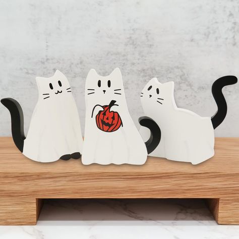 PRICES MAY VARY. To brighten your Halloween decor- This cutest ghost cat wood blocks set won't let you down in this spooky season. The package includes 3 pcs black cat ghosts with different figures. Perfect tier tray standing size- Cat Halloween figures measure about 6'' tall, 5'' wide, and 0.75'' thick. Sturdy and thick enough to self-standing on tier tray, shelf, coffee bar, mantel, kitchen table, riser window sill, and any other places you would like to place. Rustic fall spooky decor- Funny Wood Projects For Halloween, Halloween Cat Decor, Halloween Cat Craft, Halloween Cute Decorations, Halloween Cat Decorations, Wooden Fall Decorations, Black Pumpkin Decor, Black Cat Pottery, Halloween Cat Crafts