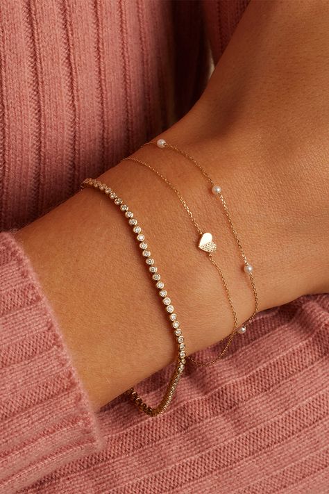 Add a little love to your stack with a diamond and solid gold heart bracelet. This heart bracelet comes in a set so you can match with your best friend, mom, sister or another loved one. Braclets Idea Gold, Silver Dainty Bracelets, Gold Cute Jewelry, Dainty Heart Bracelet, Bracelet Aesthetic Gold, Bracelet Stack Simple, Initial Bracelet Couples, Dainty Bracelet Stack, Bougie Aesthetic