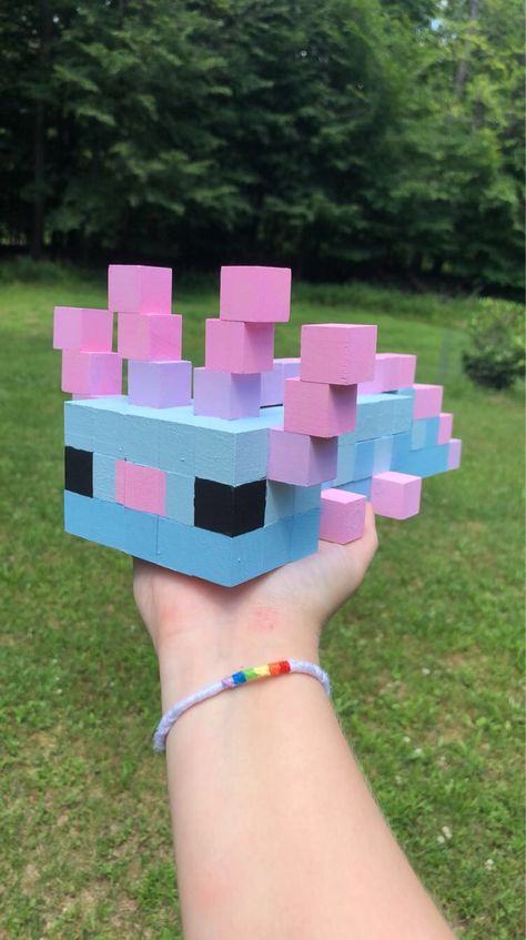 “white” blue and pink wooden block minecraft axolotl Minecraft Flower Out Of Blocks, Minecraft Axalotal, Diy Minecraft Wooden Blocks, Axolotl Minecraft Block Art, Block Art Minecraft, Diy Minecraft Axolotl, Wooden Block Art Ideas, Wooden Blocks Decor Craft Ideas Minecraft, Minecraft Pink Decoration