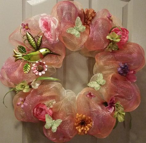 Hummingbird wreath, butterflies, flowers, multi colored mesh. https://www.facebook.com/thisandthatwreathsandcrafts Hummingbird Wreath Ideas, Hummingbird Wreath, Christmas Box Frames, Butterfly Wreath, Butterflies Wreath, Butterflies Flowers, Sweet Summertime, Wreath Making, Wreath Ideas