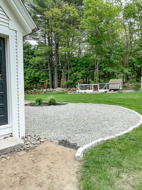 I'm so excited to share this project with you today. How we installed   the gravel patio around our fire pit area. New gravel patio area next to   the house. I included a full budget breakout. New Gravel Patio - Rooms   For Rent blog #newpatio #gravelpatio #homedesign #installation   #budgetbreakdown #blogpost #homeimprovement Pea Pebble Patio Backyard Ideas, River Rock And Pea Gravel Landscaping, Beautiful Pea Gravel Patios, Peastone Patio Ideas, Gravel In Backyard, Garden White Stones, Stone Outdoor Flooring, Backyard Gravel Ideas, Stone Garden Design