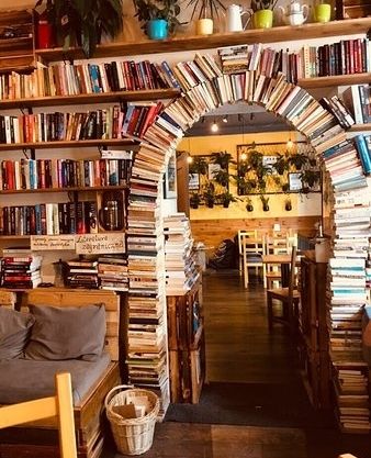 Today is #WorldBookDay, where #SundayReads leads us to Kraków, Poland and @cytat_cafe at 23 Miodowa Street in the Kazimierz District. Cytat Café is a home away from home for the bookish, with a library of reading material, tasty food and coffee, and cozy nooks for reading and relaxing. You may just want to spend the day right here. #worldbookday #bookstagram #sundayreading #books #booklover #librarylife #bookshelf #literature #librarylove #librarian #Levenger Book Store Ideas Design, Cozy Book Cafe, Library And Coffee Shop, Library Coffee Shop, Book Cafe Ideas, Cozy Bookstore, Book Cafe Aesthetic, Cozy Bookstore Aesthetic, Bookstore Design