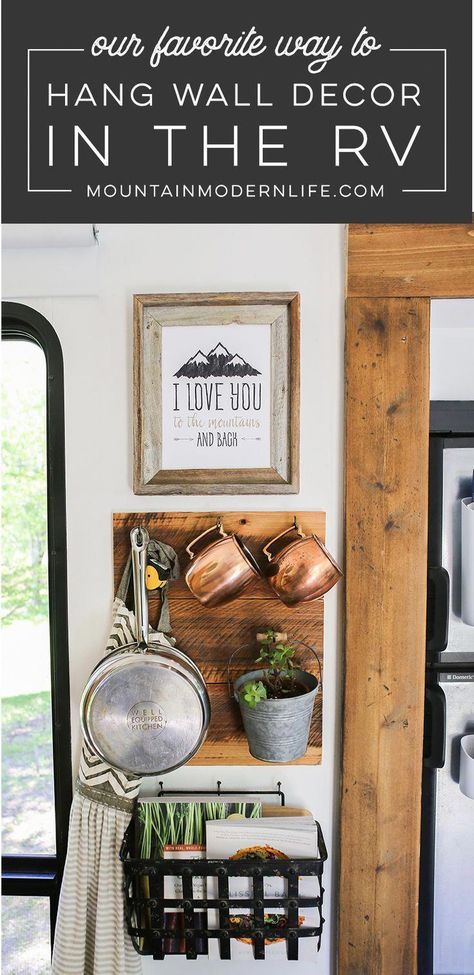 Looking for ways to easily hang frames without using screws or nails? Check out our favorite way to hang wall decor in the RV! MountainModernLife.com #glampingitems #rvdecorating Rv Decorating Ideas Rv Interior, Hang Wall Decor, Travel Trailer Decor, Rustic Outdoor Kitchens, Camper Trailer Remodel, Trailer Decor, Camper Hacks, Travel Trailer Camping, Diy Camper Remodel