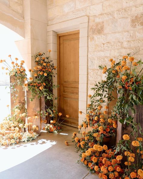 Stepping into a new chapter surrounded by the vibrant warmth of marigolds. 🌼✨ A moment paused in timeless grace. Host: @styledshootsacrossamerica Planning: @heatherbengeofficial Assistant Planners: @alexiawoolumssaa @amodernfete @lacedwithgraceinfo @akbrides Venue: @sunstonewinery @sunstonevilla Hair & Makeup: @sunkissedandmadeup Bridal Accessories: @janicetan_co Gown: @styled.gowns Men’s Wear: @friartux Floral Design: @kekoafloraleventstyling Students of @intrigue_designs workshop Floral... Marigold And Eucalyptus, Marigold And Mustard Wedding, Marigold Floral Arrangement, Orange And Yellow Wedding Flowers, Marigold Centerpiece Wedding, Marigold Arch, Marigold Flower Wedding, Marigolds Wedding, Marigold Wedding Flowers