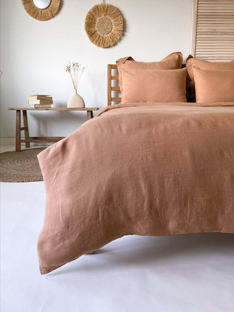 The Duvet cover is made of Best Quality 200 TC Pre-Shrunk Washed Linen Fabric. This duvet cover is made from pure natural organic Linen, fabric which doesn’t accumulate dust on the surface. Natural Linen color bring an atmosphere of raw nature to your bedroom. Neutral color and minimalistic design will bring refreshing purity to your bedroom. Marital- Linen Color :- Desert Rose Pattern :- Solid Printed Closure :- Buttons & 4 Interior Corner Ties. Cream Duvet Cover, Rose Duvet Cover, Unique Duvet Covers, Bedroom Linen, Bedding King, Boho Duvet Cover, Boho Duvet, Beige Bed, Linen Duvet Cover