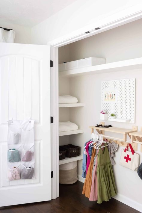 Easy DIY Built-In Closet Shelving | One Room Challenge - Week 4 - Free and Unfettered How To Put Shelves In A Closet, How To Make Shelves In A Closet, Bifold Closet Storage Ideas, Diy Shelves Closet, Floating Shelves In Closet, How To Build Shelves In A Closet, Floating Shelves Closet, Closet Floating Shelves, Toddler Closet Organization