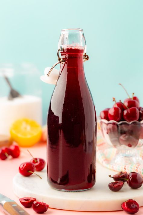 Skip store syrups with additives and artificial flavors. Try homemade Cherry Simple Syrup—just cherries, sugar, water, and lemon. In 40 minutes, savor the sweet, fresh cherry flavor on everything! Pitted Cherry Recipes, Homemade Cherry Syrup, Cherry Vanilla Syrup, Easy Simple Syrup, Flavored Simple Syrup Recipe, Cherry Syrup Recipe, Grape Simple Syrup, Cherry Pit Simple Syrup, Nanking Cherry Syrup