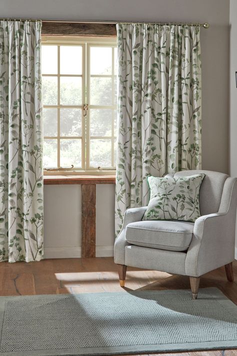 Our Isla curtains are designed with a beautiful watercolour floral print that'll add style to every space. With a thick blackout lining designed to shut daylight out with dramatic light exclusion while also keeping heat in during the winter and the room cool during the summer. Our 3 Pencil pleat header has small, neat folds at the top of the curtain creating a beautiful drape. Pencil pleat curtains can be hung on a track using hooks, or on a pole using hooks and rings (hooks/rings not included). Green Curtains Living Room, Pencil Pleat Curtains, Leaf Curtains, Thick Curtains, Pleat Curtains, Types Of Curtains, Green Curtains, Watercolor Floral Print, Country Living Room