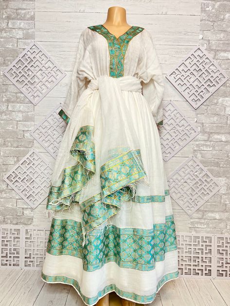 Handmade Ethiopian traditional dress next day delivery available in USA Ethiopian Fabric, Ethiopia Clothing, Habesha Kemis Ethiopian Dress, Habesha Clothes, Ethiopian Dresses, Abaya Mode, Ethiopian Culture, Eritrean Dress, Beautiful Ethiopian