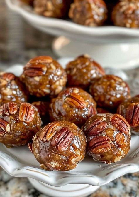 Looking for a quick and easy dessert? These Pecan Pie Balls are a no-bake treat made with pecans, graham crackers, and a hint of cocoa, rolled in powdered sugar for that perfect sweet touch. Ready in just 15 minutes, they’re great for the holidays, parties, or an anytime snack. Save this pin and try them for yourself today! #PecanPieBalls #NoBakeDessert #HolidayTreats #PecanRecipes #EasyDesserts Pecan Balls 4 Ingredient, Pecan Pie Balls Recipe Simple, Pecan Balls With Powder Sugar, No Bake Pecan Pie Balls, Pecan Pie Balls No Bake, Pecan Balls Recipe, Pioneer Woman Pecan Pie, Pie Balls, Pecan Pie Balls