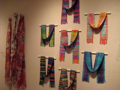 Love the way these are displayed.  created by risa: Nourishing my creative soul Weaving Display Ideas, How To Display Scarves At A Craft Show, How To Display Scarves, Weaving Display, Scarf Display Ideas, Display Scarves, Hang Scarves, Market Stall Display, Scarf Display