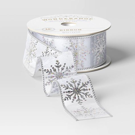 Make your gifts sparkle this holiday season with this 1.5-Inch Sheer Fabric Snowflake Christmas Ribbon from Wondershop™. The sheer fabric, embellished with snowflakes and subtle color highlights, adds a festive touch to any present. Plus, with 15 feet on the roll, it offers plenty of length for wrapping gifts for everyone on your list. Welcome to the Wondershop™. Rainbow Gift, Glitter Ornaments, Womens Ministry, Fabric Snowflake, Christmas Glitter Ornaments, Color Highlights, Christmas Glitter, Wrapping Gifts, Large Gift Bags