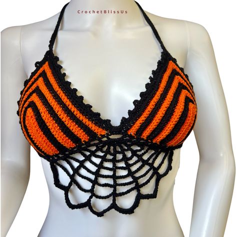 Early Halloween Spirit Captivating Orange And Black Color Palette Intricate Spider Web Design At The Bottom Meticulously Crafted With Love And Care Adds A Touch Of Spooky Sophistication Perfect For Costume Parties And Halloween Enthusiasts Unique And One-Of-A-Kind Piece Embraces The Enchanting Spirit Of The Season You Can Find The Mannequin Size That I Use For The Photos In The Last Picture. Get Ready To Turn Heads And Make A Statement With This Bewitching Crochet Top! Crochet Mushroom Top Pattern, Sports Weight Yarn Crochet Patterns, Fall Crochet Clothing Ideas, Halloween Crochet Patterns Free Clothes, Gothic Crochet Clothes, Halloween Patterns Crochet, Crochet Halloween Top Free Pattern, Crochet Skull Top, Crochet Brown Top