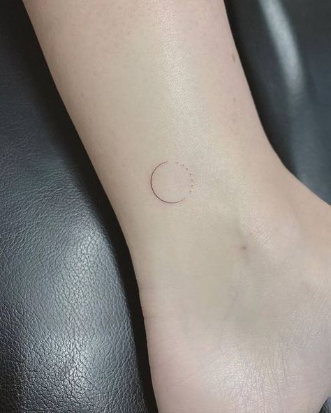 Small and minimalist sun and moon ankle tattoo Circle Tattoo Minimalist, Circle Ankle Tattoo, Single Needle Moon Tattoo, Minimalist Circle Tattoo, Circle Line Tattoo, Simple Circle Tattoo, One Needle Tattoos, Minimalist Foot Tattoo, Circular Tattoo Placement