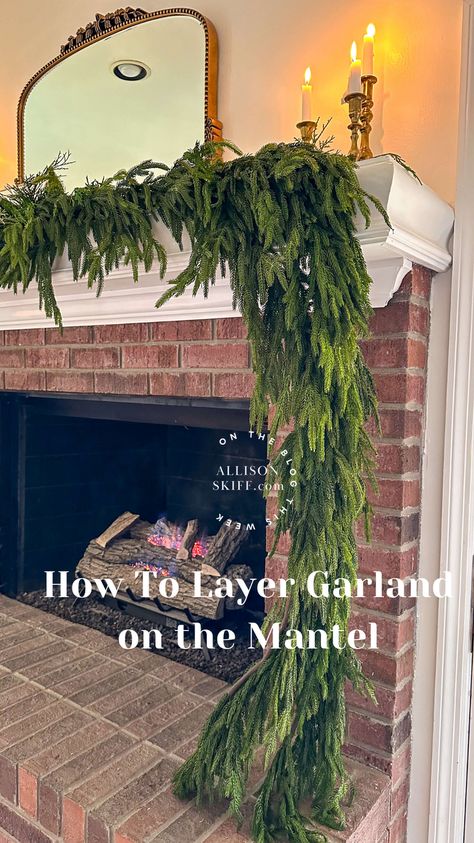 Have you been dreaming of a beautiful sweeping garland design for your mantel? Follow my step-by-step tutorial for how I created an asymmetrical garland design on my fireplace this Christmas. I breakdown how many pieces I used, how I secure them and my exact sources to achieve this look. Asymmetric Christmas Mantle, Fireplace Christmas Mantel, Mixed Greenery Garland, Large Christmas Garland, Cascading Garland Christmas, Diy Garland For Mantle, Fireplace With Garland, Add Garland To Christmas Tree, Fireplace Mantel Garland