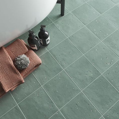 DRAWING INSPIRATION FROM STARDUST AND LUNAR PARTICLES IN OUTER SPACE, INTERPRETED THROUGH TEXTURE AND COLOR APPLICATION SHOWCASING A VISION OF COSMIC CHARM. Teal Tile, Statement Tiles, Teal Bathroom, Green Interior Design, Pebble Tile, Terrazzo Tile, Kitchen Splashback, Tile Companies, Bathroom Floor Tiles