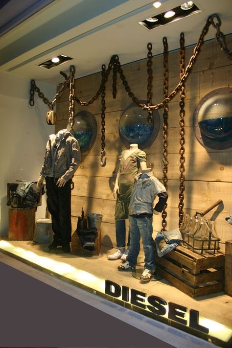 Chains Hanging From Ceiling, Diesel Window Display, Denim Visual Merchandising, Denim Window Display, Visual Merchandising Ideas, Visual Merchandising Display, Denim Display, Hanging From Ceiling, Chain Display