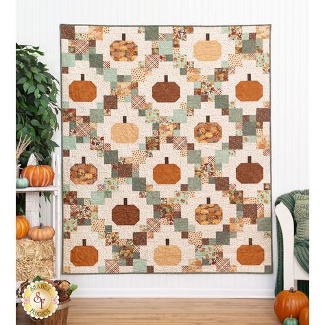 Bring the festive fun of the farm to your home with the Pumpkin Patches quilt, designed by Cluck Cluck Sew and colored using the gentle Hello Autumn collection from Maywood Studio. Featuring dynamic rows of patchwork and pumpkin blocks in complementary fall colors, this quilt will bring a touch of autumn elegance to any space. Quilt finishes to approximately 60" x 72". This lovely project is perfect for beginners and seasoned quilters alike. Kit Includes Pattern All fabrics for Top including binding FREE U.S. Shipping! Forest Animals Quilt Patterns, Easy Fall Quilt Patterns Free, Pumpkin Blocks Quilt, Cluck Cluck Sew Patterns, Autumn Patchwork Quilt, Fall Quilt Ideas, Fall Quilt Blocks, Book Quilt Pattern, Brightly Quilt