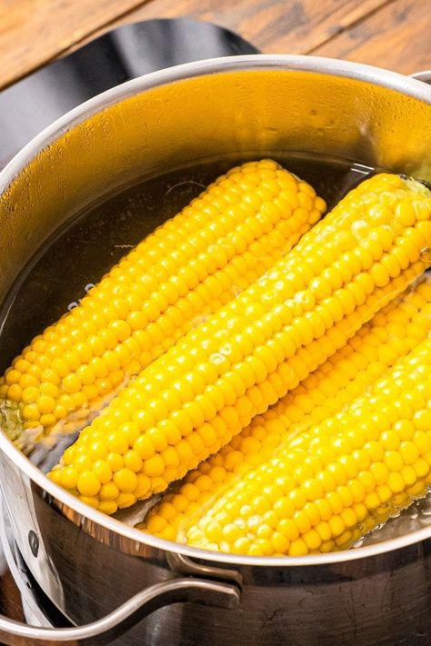 Corn on the cob is a summer staple and we are going to teach you how to make it perfectly, so it's tender, juicy and delicious. Tips and Tricks on How to Boil Corn on the Cob so you can enjoy it all summer long! #corn #recipe Boil Corn On Cob, How To Boil Corn, Corn Recipes Cob, Boil Corn On The Cob, How To Reheat Steak, Balsamic Steak, Yummy Summer Cocktails, Corn Nut, How To Make Corn