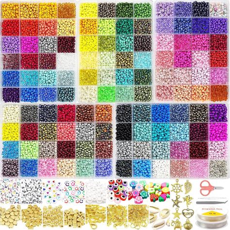 PRICES MAY VARY. Great Value Jewellery Making Kit:A box of about 14400pcs glass seed beads in 120 colors, 300pcs colorful letter beads,50pcs golden beads,30pcs gold heart beads, 30pcs gold star beads,20pcs gold square beads,30pcs white pearl,8pcs unique pendant, 10pcs evil eye beads, 20 different style polymer clay beads contain fruite, flowers, evil eye,20pcs lobster clasp,80 jump rings，40 buckles,2pcs Elastic Rope and 1pc Scissors.Great value for money, take it away at once! Complete Styles & Evil Eye Beads, Jewelry Making Kits, Bead Charms Diy, Diy Bracelets Patterns, Jewelry Making Kit, Rice Bead, Bracelet Kits, Beads Bracelet Design, Small Beads