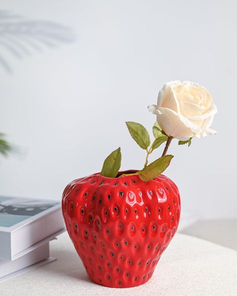 PRICES MAY VARY. Sweet Strawberry Design: This flower vase inspired features a 3D rendition of a strawberry with textured detailing. Its vibrant red color instantly catches attention and adds a touch of vitality. Durable and High-Quality: The unique vase is made of premium ceramic material, smooth surface, sturdy and durable for long use. Perfect Present: This strawberry vase is a wonderful present choice for birthday, housewarming, or any special occasion. Surprise your loved ones with this del Strawberry Party Decorations, Strawberry Vase, Strawberry Ceramic, Girly Home Decor, Cute Vase, Girly Home, Different Home Decor Styles, Strawberry Kitchen, Strawberry Flower