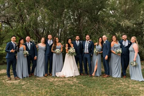 Bridesmaids in dusty blue dresses and groomsmen in navy blue suits for a Fort Collins Wedding in Colorado. This dusty blue themed Colorado wedding had an outdoor wedding ceremony and a tented wedding reception. Navy Groomsmen, Navy Blue Wedding Theme, Blue Groomsmen, Light Blue Bridesmaid Dresses, Dusty Blue Dress, Light Blue Bridesmaid, Navy Blue Bridesmaids, Pictures Outfits, Blue Suit Wedding