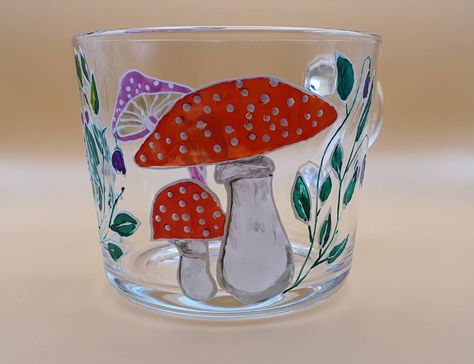 "Beautiful hand painted glass cup. This new glass cup is painted with acrylic paint. As this is a handmade product, there may be some imperfections; however, this increases the guarantee that each piece made will be unique. - From this mug, you drink hot and cold drinks as well.  -CAN NOT use in microwave. When you cleaning please DO NOT wash in dishwasher and never immerse in water. - Just hand washing recommended for long lasting. *I do not accept returns or exchanges for the following items b Glass Cup Painting Ideas Easy, Glass Jar Painting Ideas, Glass Cup Painting Ideas, Glass Cup Painting, Glass Jar Painting, Glassware Painting, Clear Mugs, Jar Painting, Girls Night Crafts