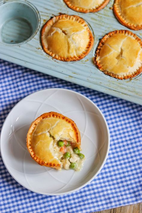 I'm sharing something different for Pi Day: individual pot pies in a muffin tin! These rich and creamy mini chicken pies are SO delicious, and it's easier than you might think to make mini chicken pot pies with pie crust using pre-made dough. Click or visit FabEveryday.com for the full muffin tin chicken pot pie recipe and tips for making chicken pot pies in muffin tins. Once you try these mini pot pies with pie crust, this will be the only muffin tin pot pies recipe that you'll ever need. Chicken Pot Pie Tarts, Chicken Pot Pie Pockets Easy, Homemade Mini Chicken Pot Pie, Individual Savory Pies, Miniature Chicken Pot Pies, Mini Veggie Pot Pies, Mini Shepards Pie Muffins, Chicken Pot Pie Pie Crust Recipe, Mini Pot Pie Recipe