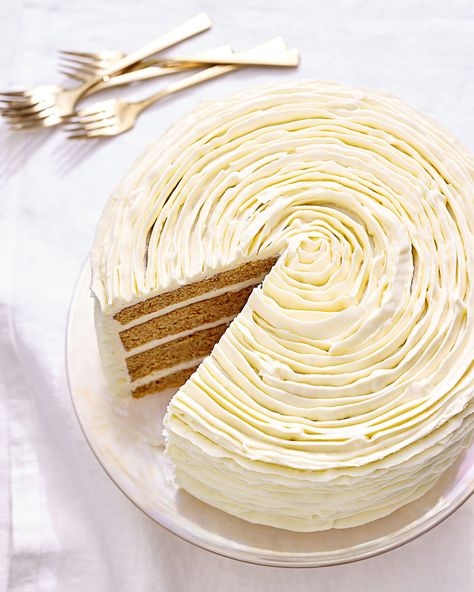 Carrot Cake with White-Chocolate Frosting | Martha Stewart - Ruffles of white chocolate-cream cheese frosting take this carrot cake to the next level. Seen from above, it looks like a rose. Make this cake a day or two ahead for the best flavor. #carrotcake #cakerecipe #chocolatefrosting White Chocolate Frosting, Best Cupcakes, Chocolate Cream Cheese Frosting, Layer Cake Recipes, Chocolate Buttercream Frosting, Chocolate Cream Cheese, Chocolate Cinnamon, Chocolate Buttercream, Chocolate Cream