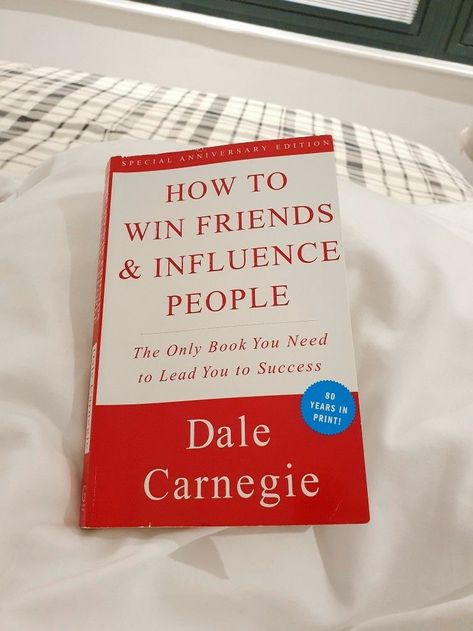 Cover image of How to Win Friends and Influence People by Dale Carnegie. The image shows the title of the book in red letters on a blue background. There is also a black and white photo of Dale Carnegie on the cover. Keywords: social skills, interpersonal relationships, success, business world, self-help. Influence People, Success Books, Empowering Books, Best Self Help Books, Friend Book, Books For Self Improvement, How To Influence People, Top Books To Read, Dale Carnegie