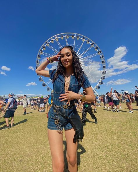 coachella outfit inspiration coachella pose instagram festival pose Free people jumpsuit black cowgirl boots black fringe bag layered jewelry coachella  2022 Festival Outfits Fringe, Romper Festival Outfit, Coachella Fits 2024, Denim Coachella Outfit, Coachella Outfit Denim, Cool Girl Festival Outfits, Coachella Picture Ideas, Coachella Cowgirl Outfit, Coachella Poses