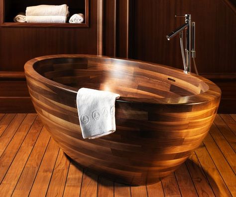 Experience what true relaxation feels like by swapping your regular tub for this wooden bathtub. This luxury tub is available in a variety of beautiful finishes to match your home's decor and comes in a deep boat design ideal for soaking in. Wooden Bath Tub, Wood Tub, Wood Bathtub, Wooden Bathtub, Japanese Soaking Tubs, Wood Bath, Wooden Bath, Bathtub Design, Bad Inspiration