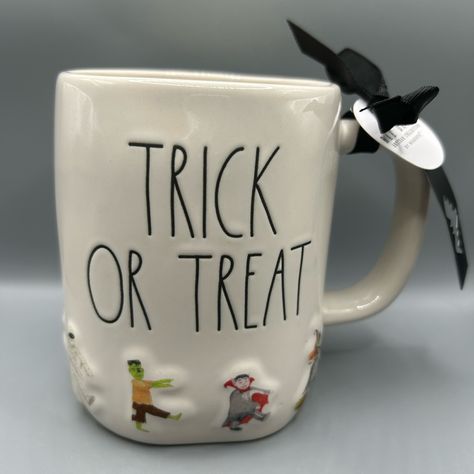 Rae Dunn Trick Or Treat Halloween Mug With Monsters Witch Mummy Vampire New Please Note That This Is A Hand Crafted Item And It Is Not Uncommon For These Pieces To Have Pinholes, Uneven Colors And Imperfections In The Finish. This Does Not Make The Item Damaged Or Defective. It Is What Makes Hand Crafted Items Unique!!! Rae Dunn Is Perfectly Imperfect! Rae Dunn Halloween, Tiered Trays, Halloween Mug, Perfectly Imperfect, Craft Items, Halloween Treats, Holiday Decorations, Trick Or Treat, New Color